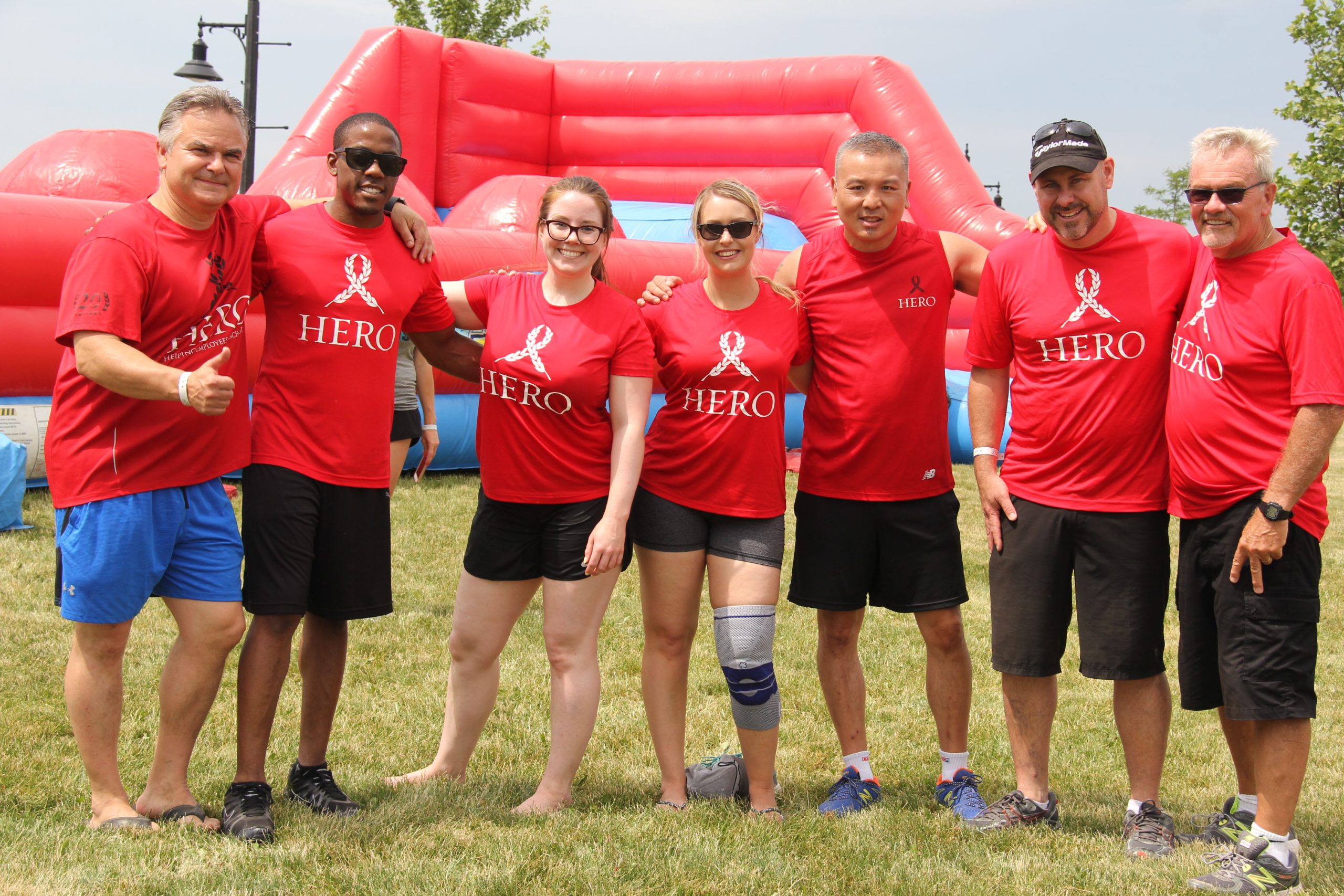 A team stands in matching "Hope" shirts at a previous Corporate Challenge event.